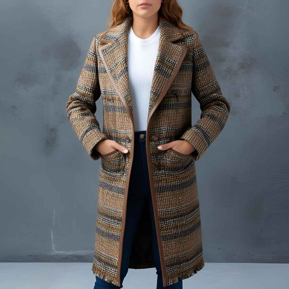 The classic single-breasted long coat is an indispensable item in any wardrobe.
